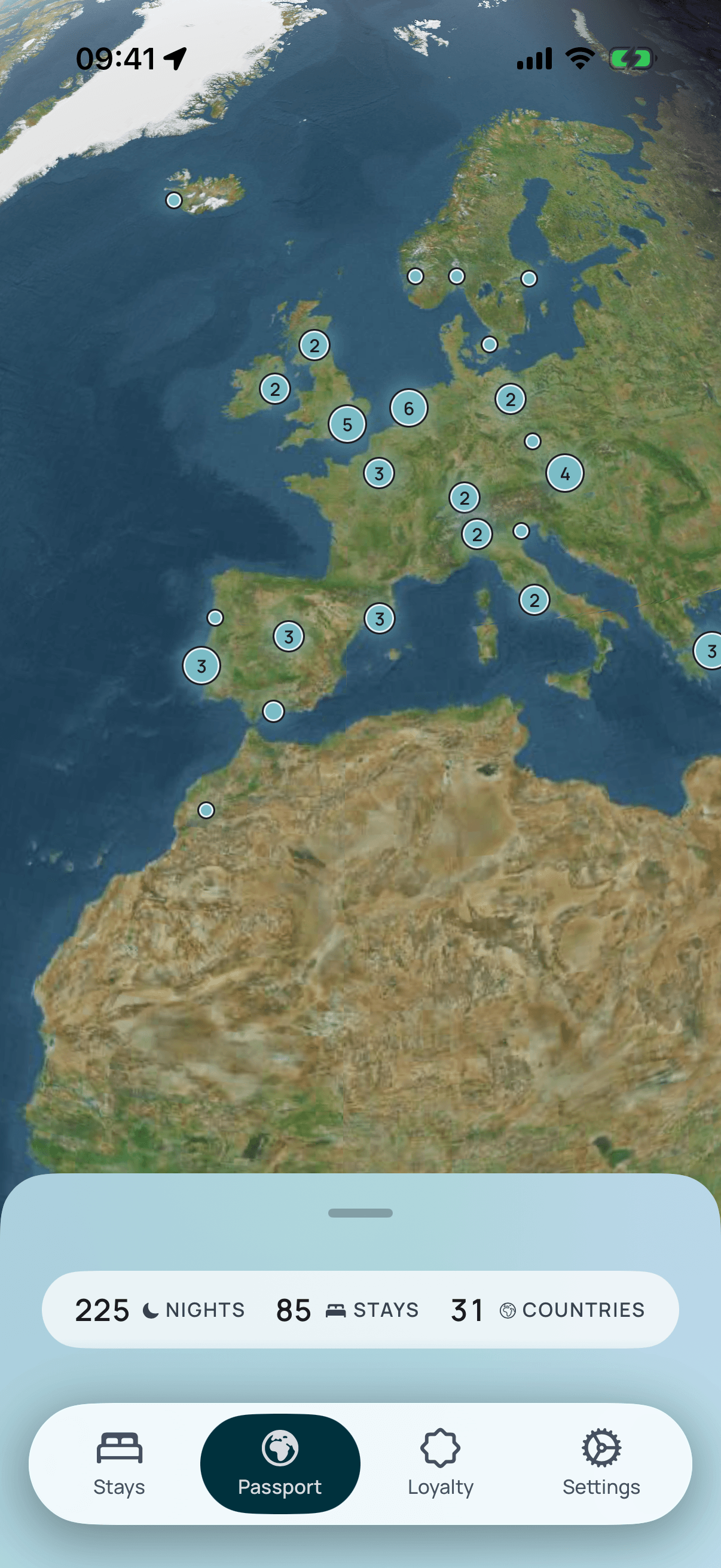 The Passport screen: a satellite globe over Europe and North Africa, pinned with everywhere you have stayed, totalling 225 nights, 85 stays and 31 countries.