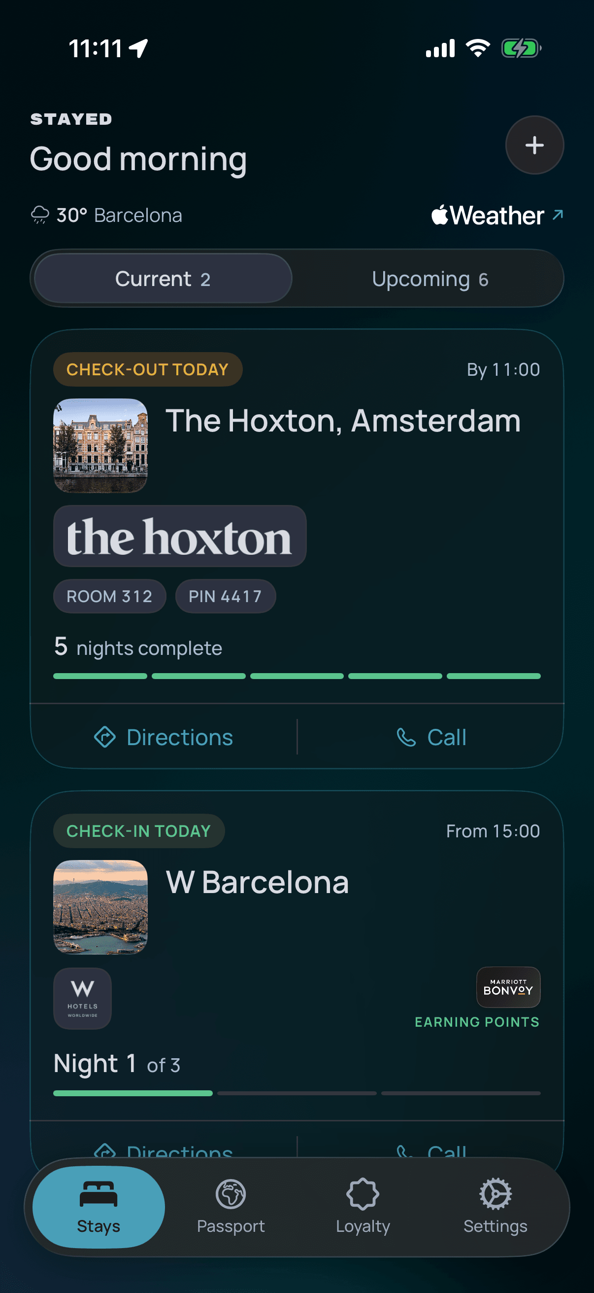 The Stays screen of the Stayed app on a hop day: check-out of The Hoxton, Amsterdam by 11:00 with five nights complete, and check-in at W Barcelona from 15:00, night one of three.